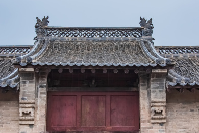 中国山西省武乡县民宅房梁龙兽屋脊装饰建筑