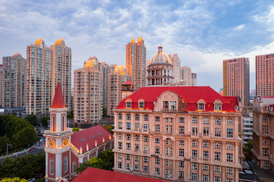 天津海河沿岸城市欧式建筑风格日落夜景风光