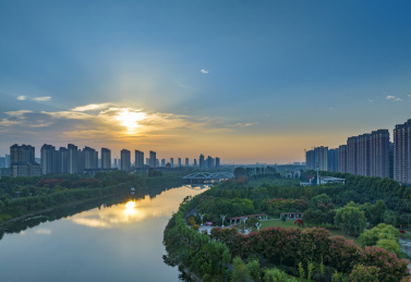 河南省禹州市市区颍河日出