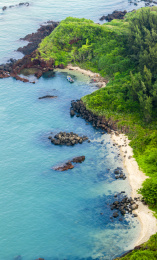 航拍海南峨蔓龙门激浪海滩