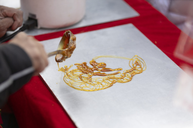 非遗项目画糖人画糖画