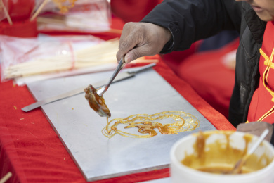 非遗项目画糖人画糖画