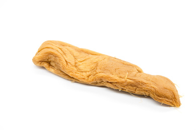 白背景一盘腌制白萝卜干