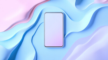 蓝色背景下智能手机的高角度视图