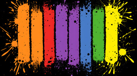 充满活力彩虹颜料溅在黑色背景上