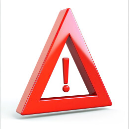 白色背景下红色箭头标志的特写镜头