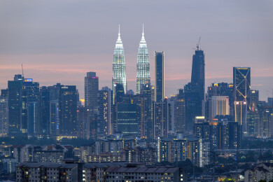 马来西亚吉隆坡莫迪卡石油双子塔日落夜景