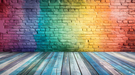彩虹光影映照的砖墙背景