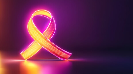 粉色橙色丝带交织的乳腺癌宣传月