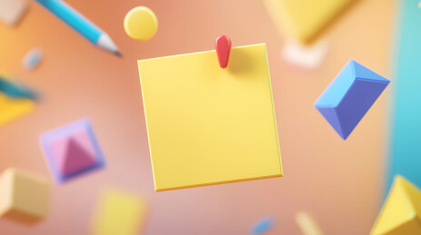 黄色便利贴与红色回形针