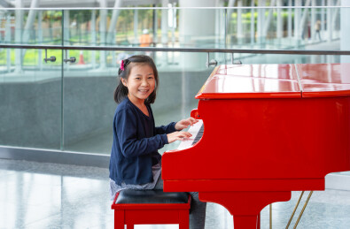 Kid playing Piano