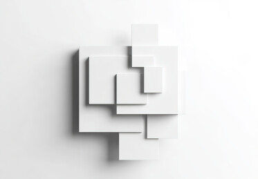 正上方白色背景的树叶和信封的照片