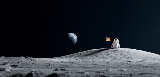 月球地表宇航员插旗遥望地球场景图