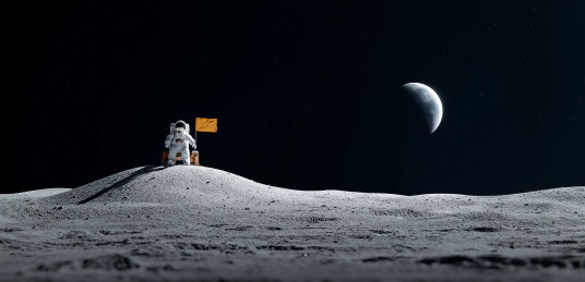 月球地表宇航员插旗遥望地球场景图