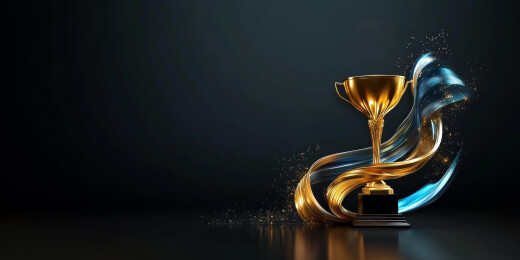 黑色背景中的金杯和流体