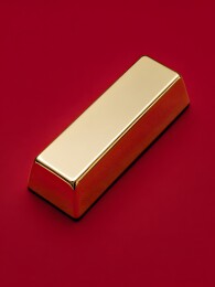 红色背景上的长方形金条
