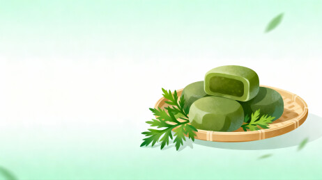 青团置于竹盘绿叶点缀