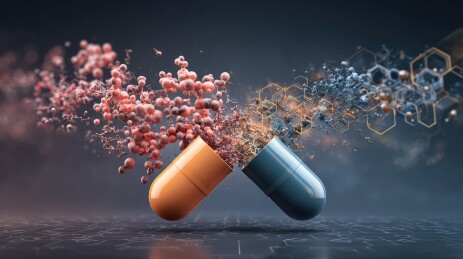 爆炸的黄蓝色药丸胶囊与彩色元素