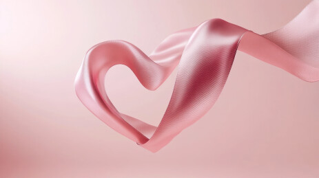 粉色丝绸布料飘舞的柔美抽象背景