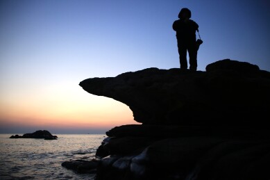 山东日照：礁石公园的海上日出太出片