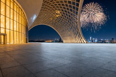 现代建筑夜景烟花绽放