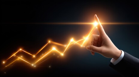 商务人士触碰发光上升曲线图