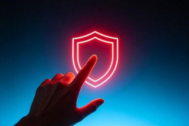 手指触碰发光盾牌图标