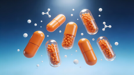 蓝色背景悬浮橙色胶囊