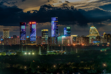 北京望京乌云夜空下的现代都市商业写字楼灯光夜景