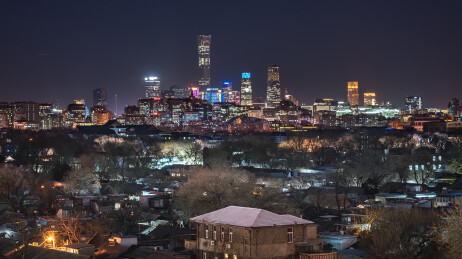北京冬日夜景 老城平房胡同眺望国贸建筑群