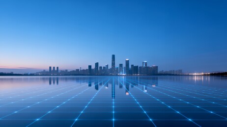 蓝色网格水面倒映现代城市天际线夜景