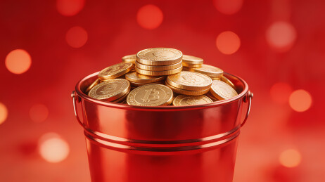 金色硬币满溢红色金属桶闪耀温暖光泽