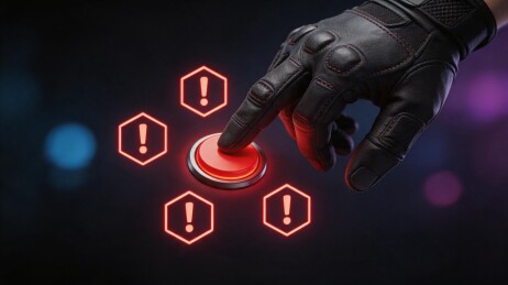 戴手套的手按红色警示按钮