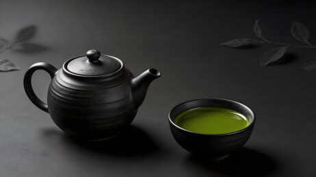 黑陶茶壶与绿茶静物