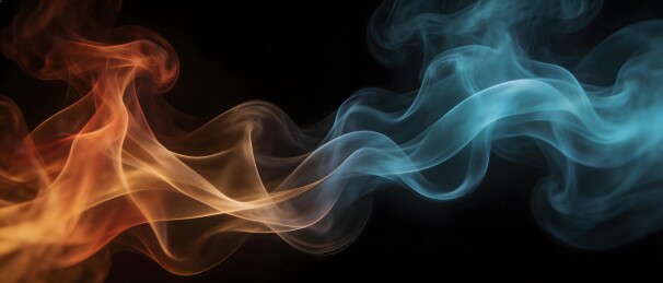 黑色背景下流动的彩色烟雾