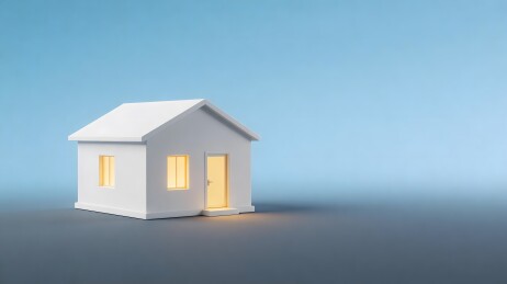 白色小屋亮灯静立蓝色背景