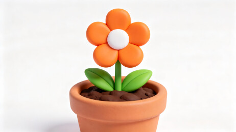 橙色塑料花在花盆中