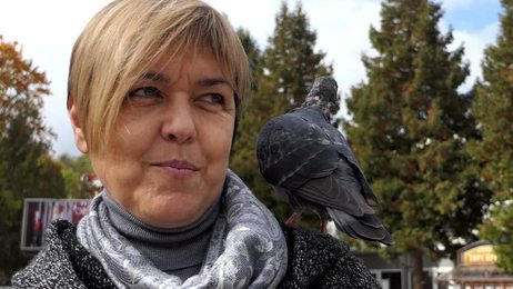 youngfairhairedmanwithacrewhaircutisdancingenergeticallyrasing